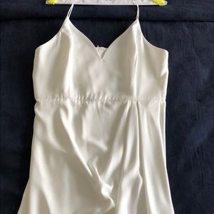 Spaghetti strapped white tulip hem dress